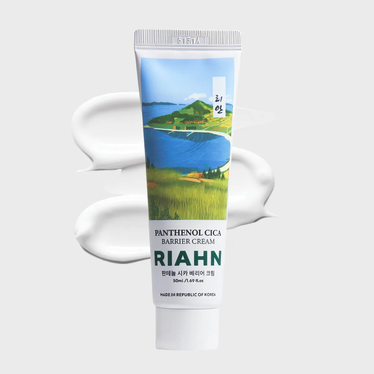 Panthenol Cica Cream: a tube over layered smears of white cream, its coastal label art above.