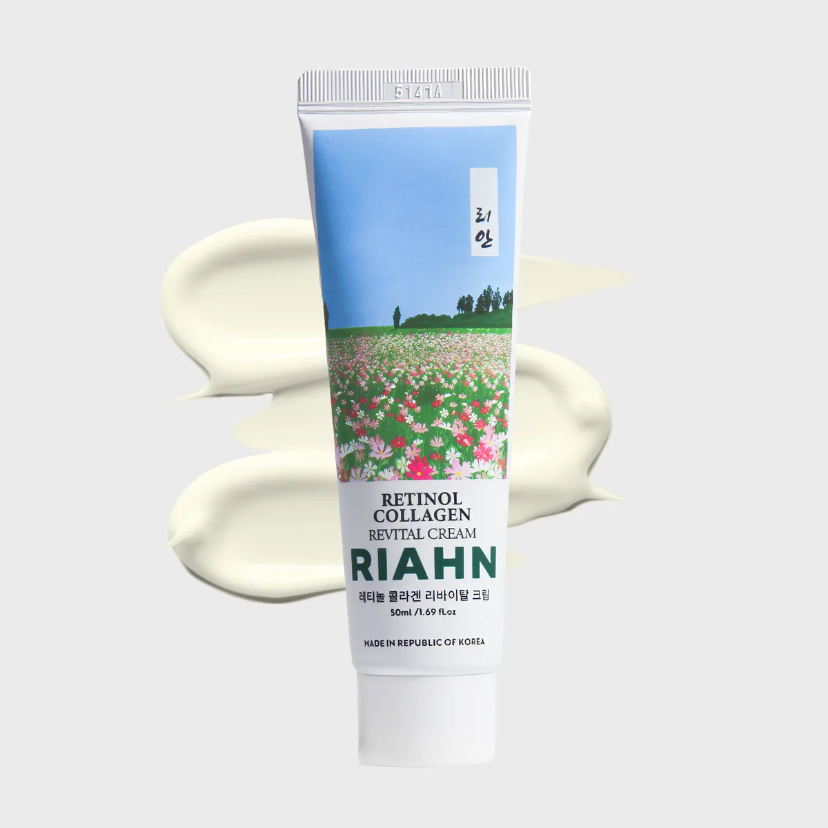 Retinol Collagen Cream: a tube over smears of soft cream, its flower-field label art above.